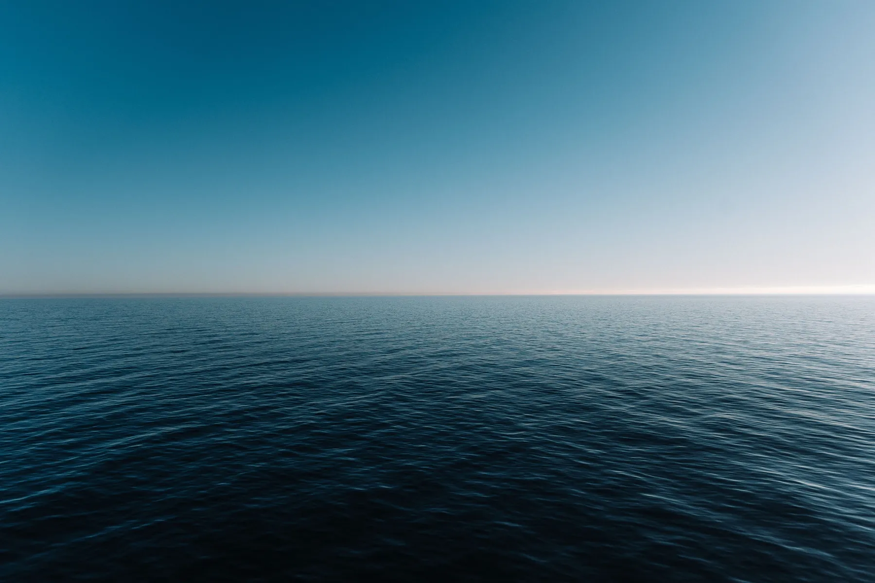 A flat calm to the horizon. Photograph: Anton Massalov, Pexels.
