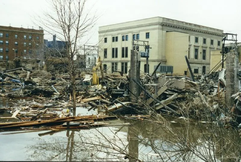 Downtown Grand Forks after the fire that burned several blocks while the floodwaters were high. Public domain (U.S. Geological Survey), via Wikimedia Commons.