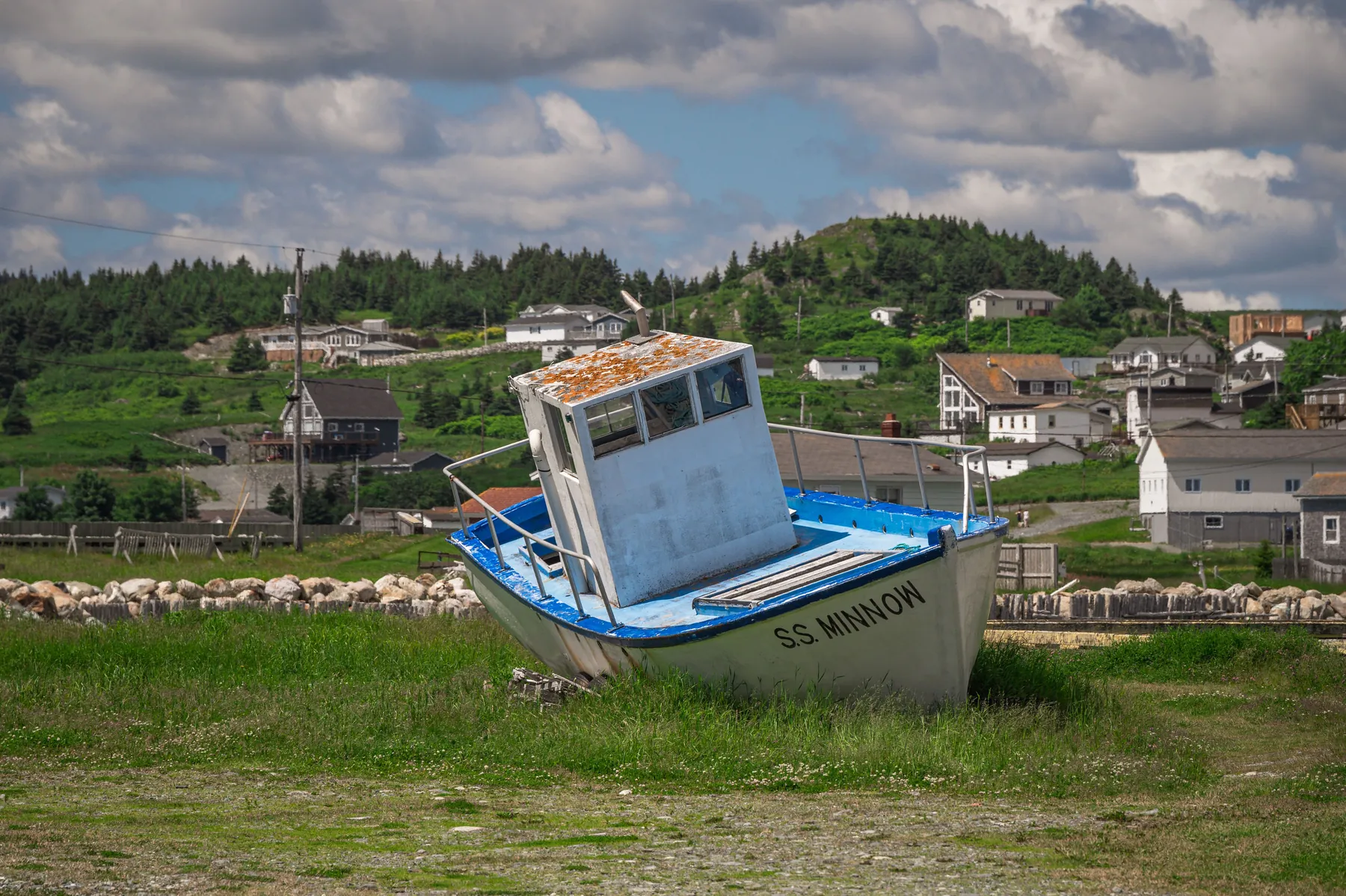 An abandoned fishing boat in the village of Ferryland, on Newfoundland's southern shore. Photograph by Ritche Perez, Pexels.
