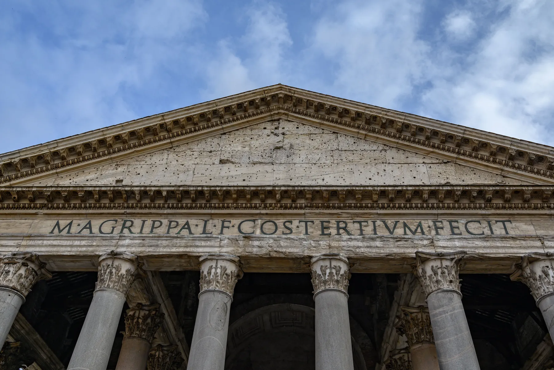 The portico of the Pantheon in Rome, with Agrippa's inscription across the frieze. Photograph by Osviel Rodriguez Valdés, Pexels.