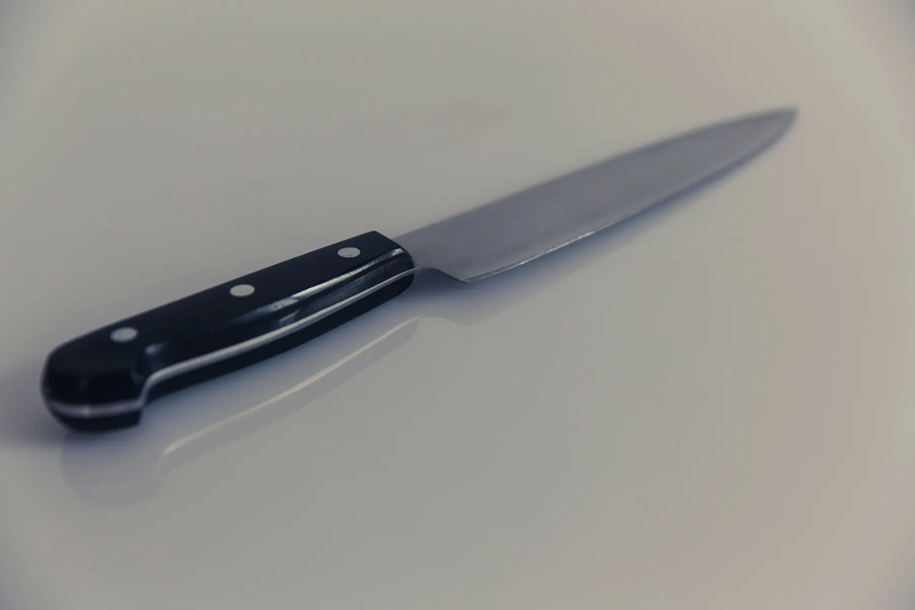 A kitchen knife on its own on a pale table. Photograph: Markus Spiske, Pexels.